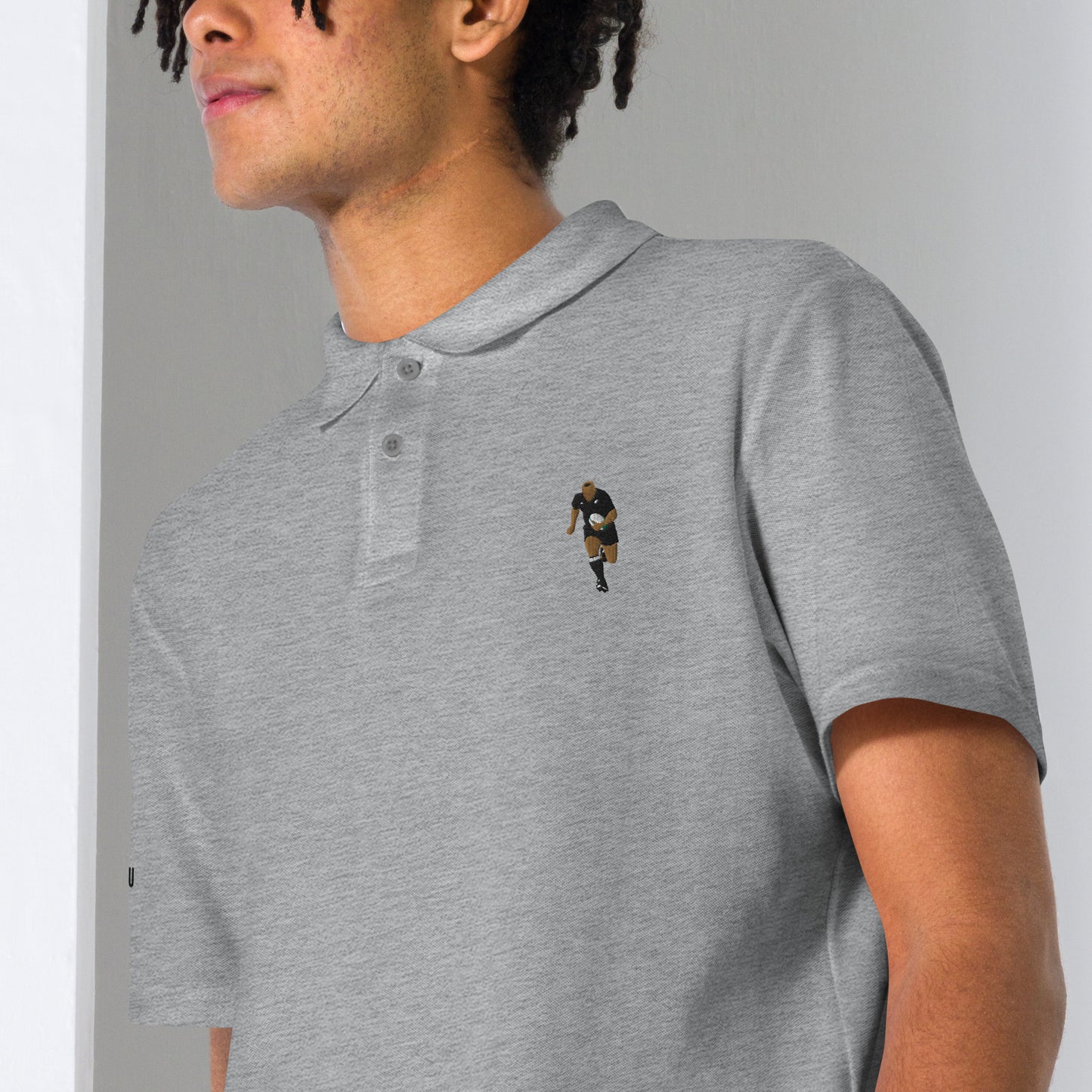 Fuerza Imparable - Polo con logo bordado